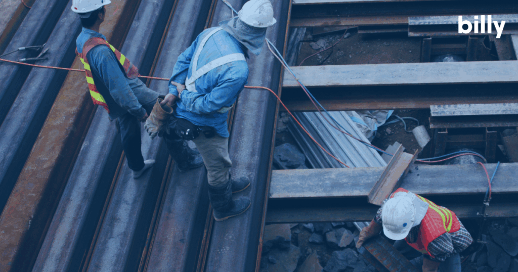 Construction workers on a job site in the fall. 